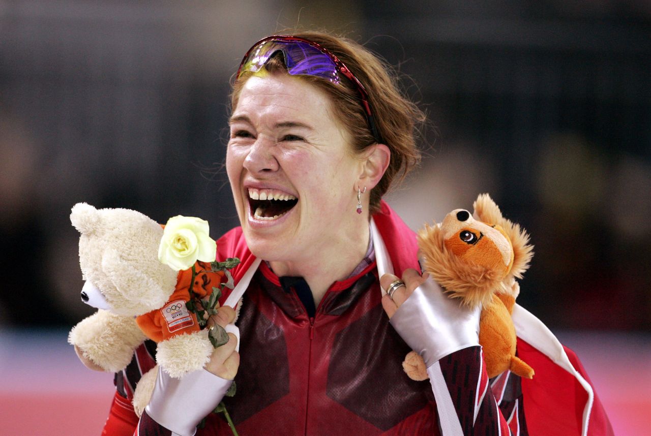 Hughes reacts after winning gold in the 5,000-meter speedskating event at the 2006 Winter Games. She won four medals in speedskating over three Olympics.