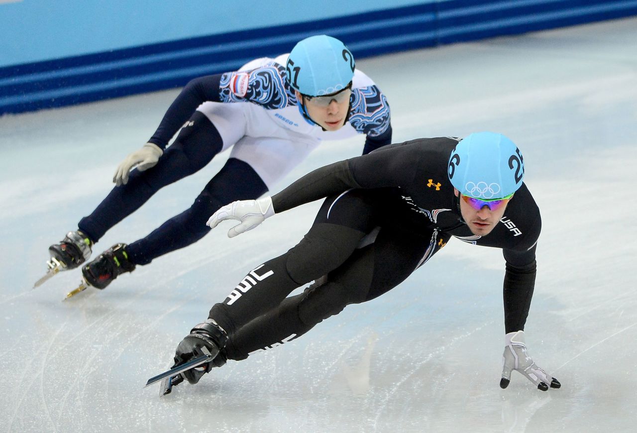 American Eddy Alvarez, right, competes in a short-track relay race at the 2014 Winter Games. Alvarez and his teammates finished with a silver in the 5,000-meter event.