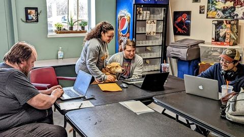 Staff at Nirvana Comics in Knoxville work on requests for copies of "Maus".
