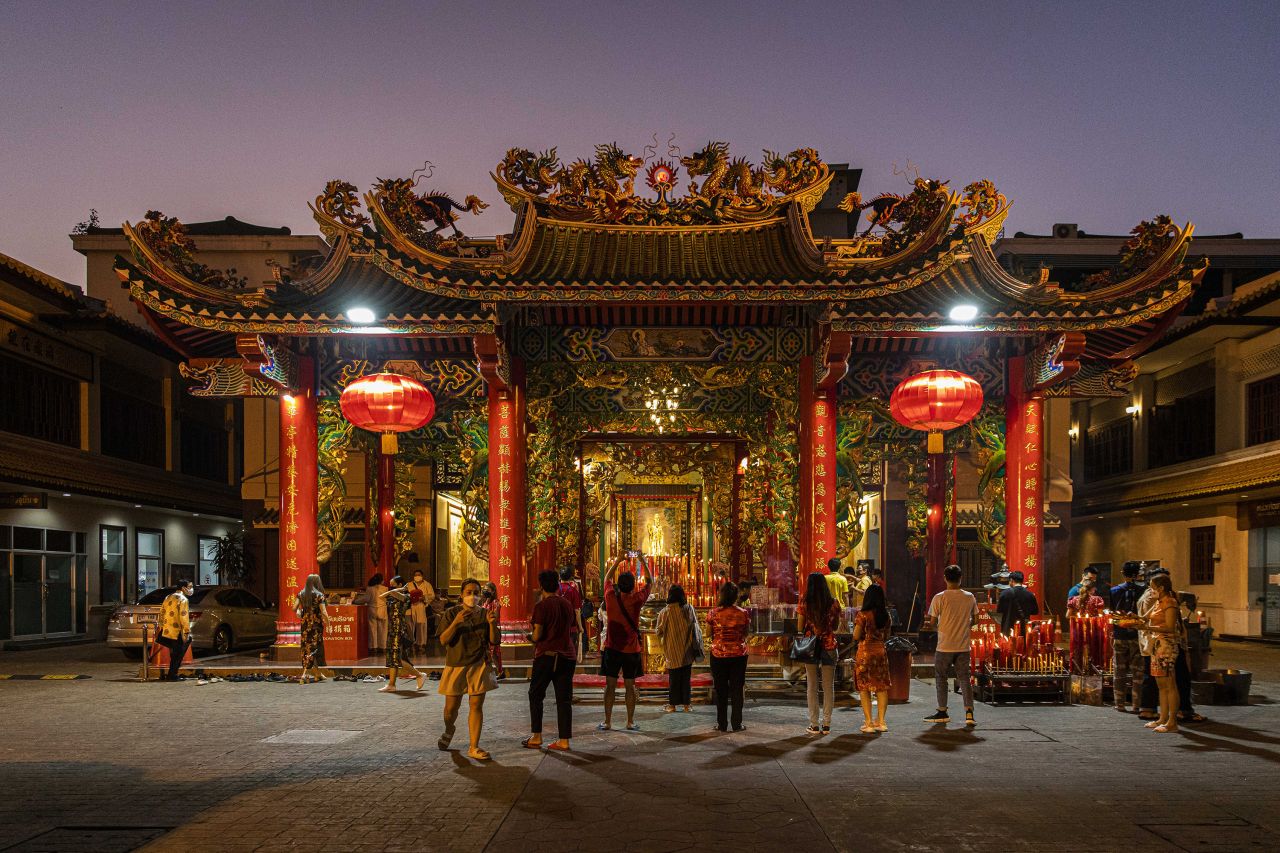 People visit the Kuan Yim Shrine in Bangkok on January 31.
