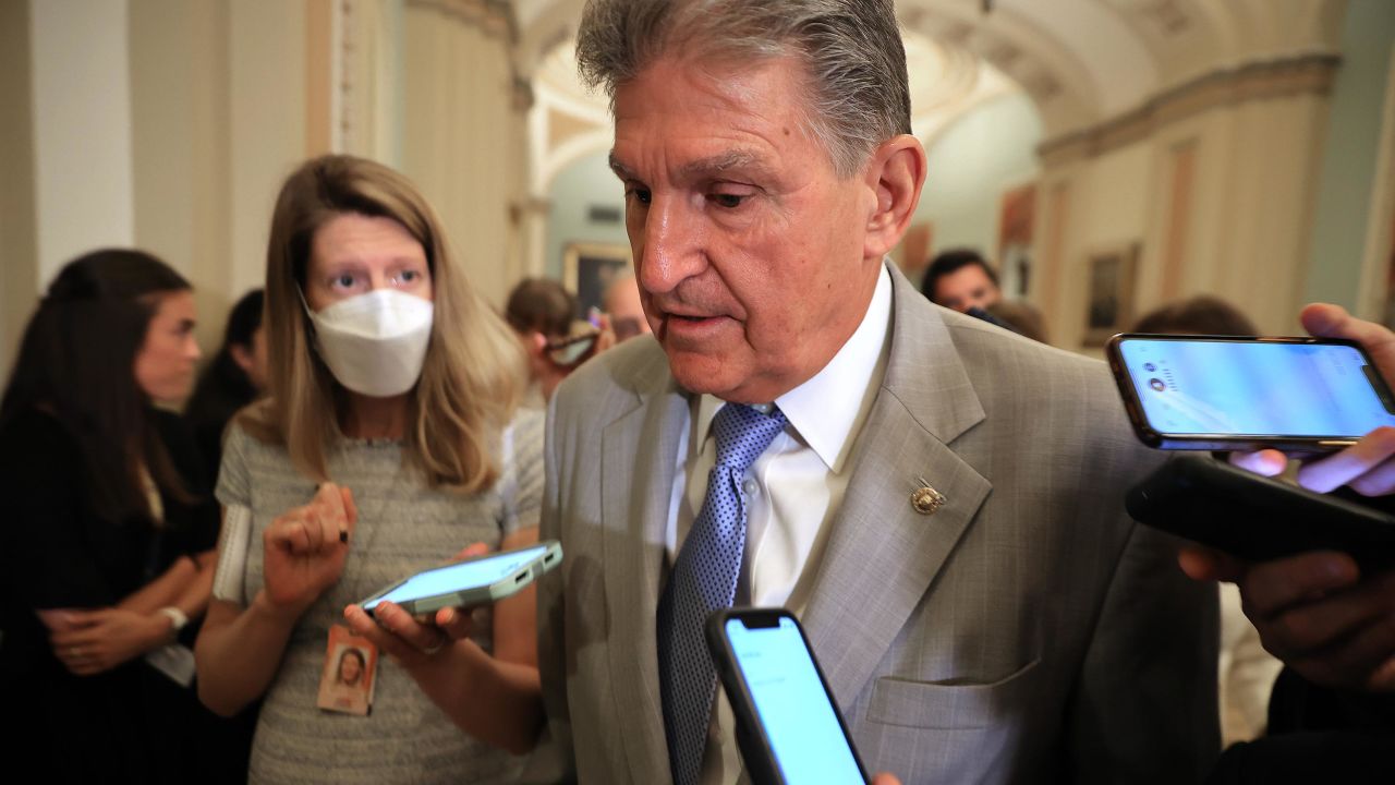 Sen. Joe Manchin talks to reporters as he leaves the the Senate Democrats weekly policy luncheon at the U.S. Capitol in July 2021 in Washington, DC.