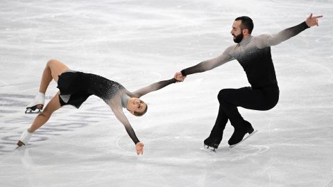 Ashley Cain-Gribble (L) and Timothy Leduc (R) during the pairs' free skating program event at the ISU World Figure Skating Championships in Sweden.