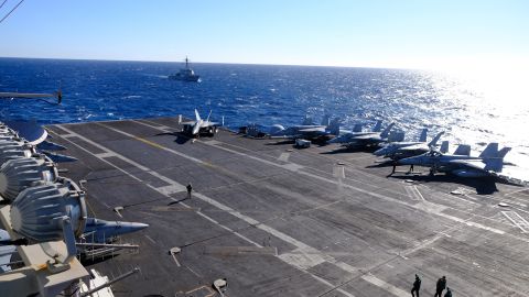 Jets are tightly packed on the flight deck of the USS Harry S Truman during flight operations.