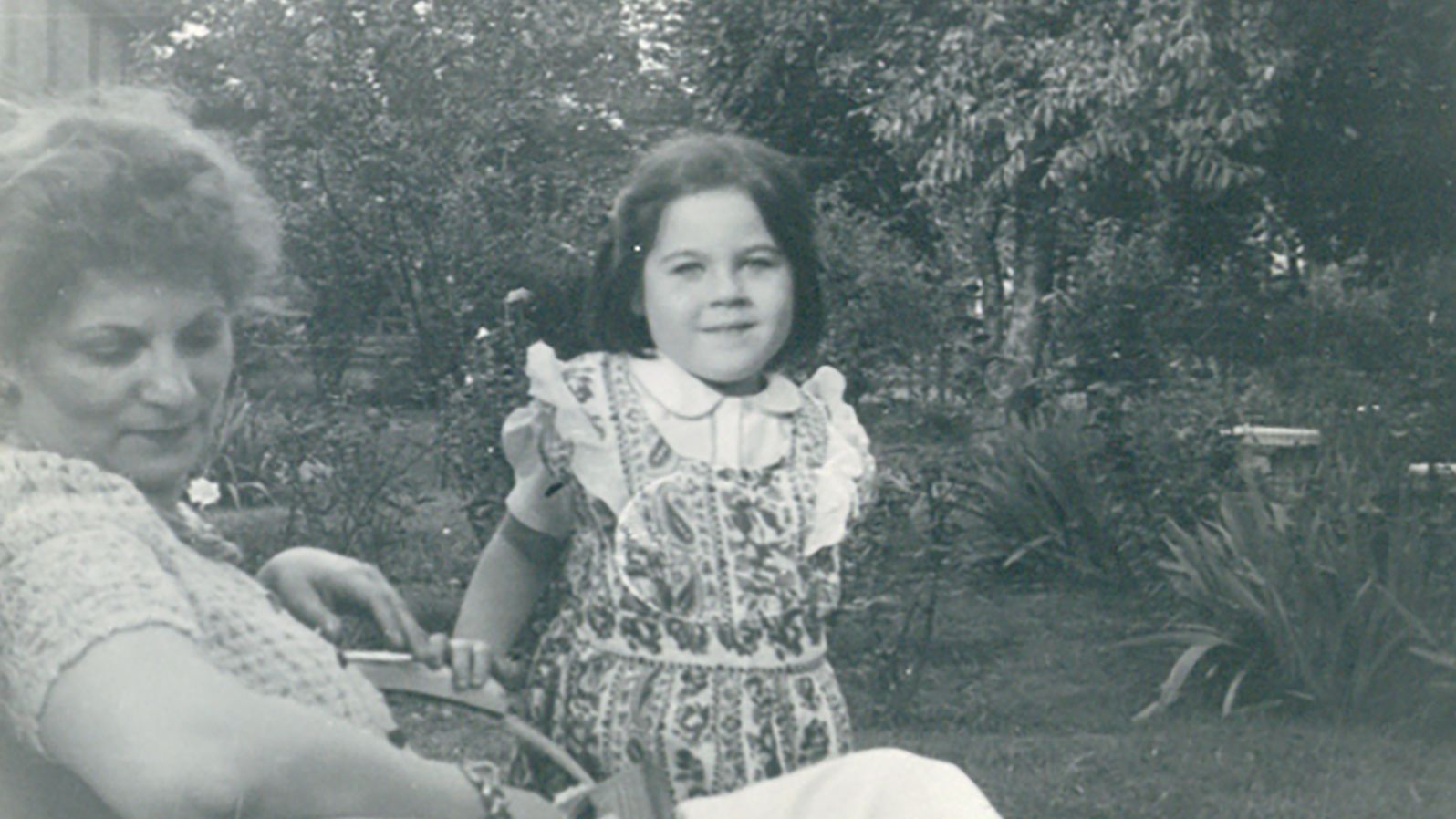 Joan Salter pictured as a child with her foster mother in the United States.