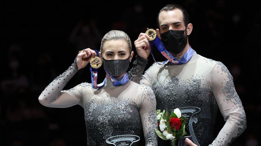 NASHVILLE, TN - JANUARY 8: Ashley Cain-Gribble and Timothy LeDuc pose on the medal podium after winning the pair skating competition at the US Figure Skating Championships on January 8, 2022 in Nashville, Tennessee .  (Photo by Matthew Stockman/Getty Images)