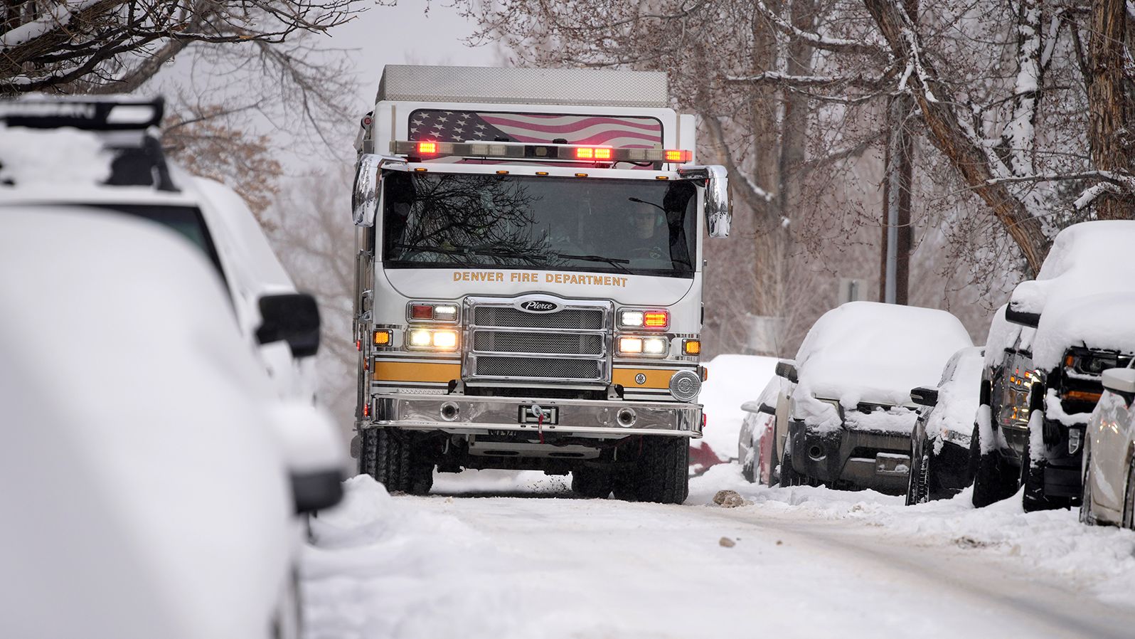 A Denver Fire Department truck heads to a call on Wednesday.