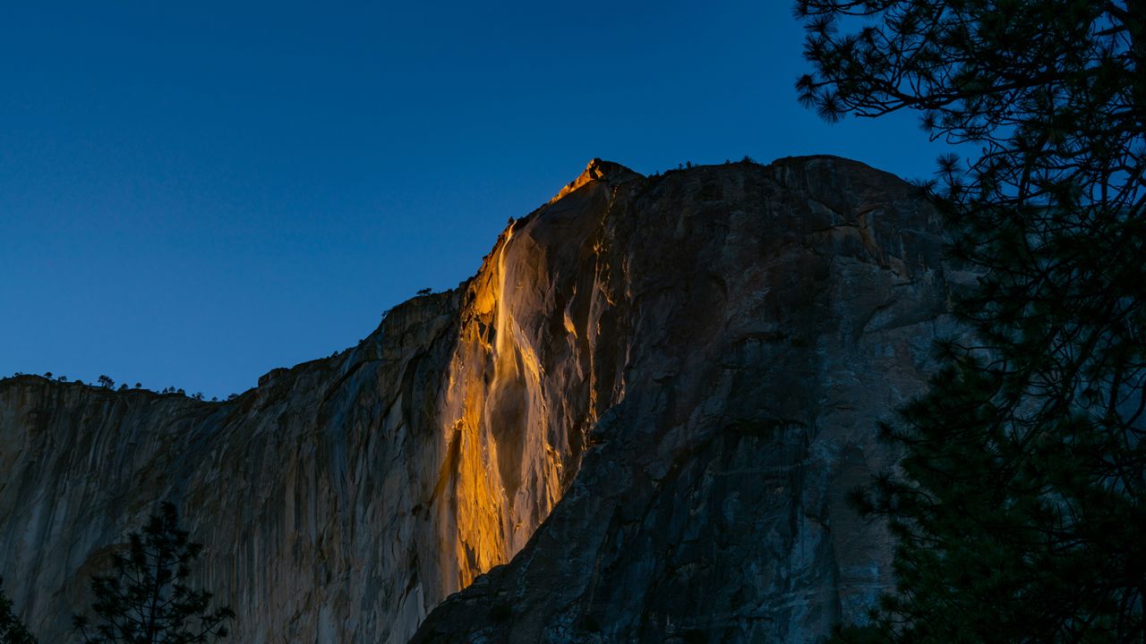 YOSEMITE, CA - FEBRUARY 24: General views of the Yosemite Firefall natural phenomenon at Horsetail Fall ending in a pinkish hue on February 24, 2021 in Yosemite, California.  (Photo by AaronP/Bauer-Griffin/GC Images)
