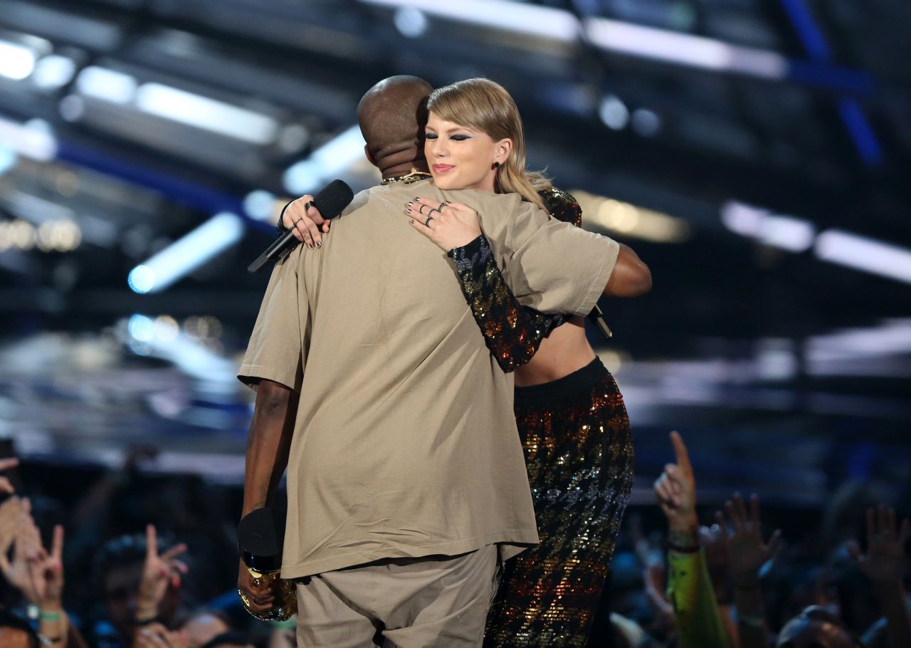 West embraces Swift after presenting him with the Michael Jackson Video Vanguard Award in 2015.