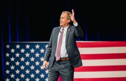 In this July 11, 2021, file photo, Texas Attorney General Ken Paxton waves after speaking during the Conservative Political Action Conference in Dallas. 