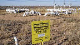 A pipeline carries natural gas underground near Midland, Texas, U.S., on Saturday, Jan. 29, 2022.