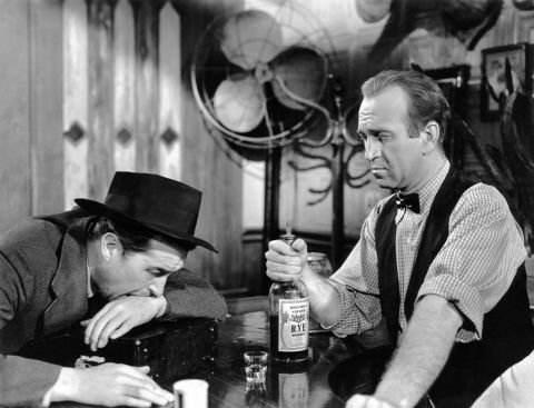 <strong>"The Lost Weekend" (1946):</strong> With World War II coming to an end, Hollywood turned to dark subject matter, such as alcoholism in Billy Wilder's "The Lost Weekend." Star Ray Milland, left, won the best actor award as a writer on a binge. Howard Da Silva was the bartender.