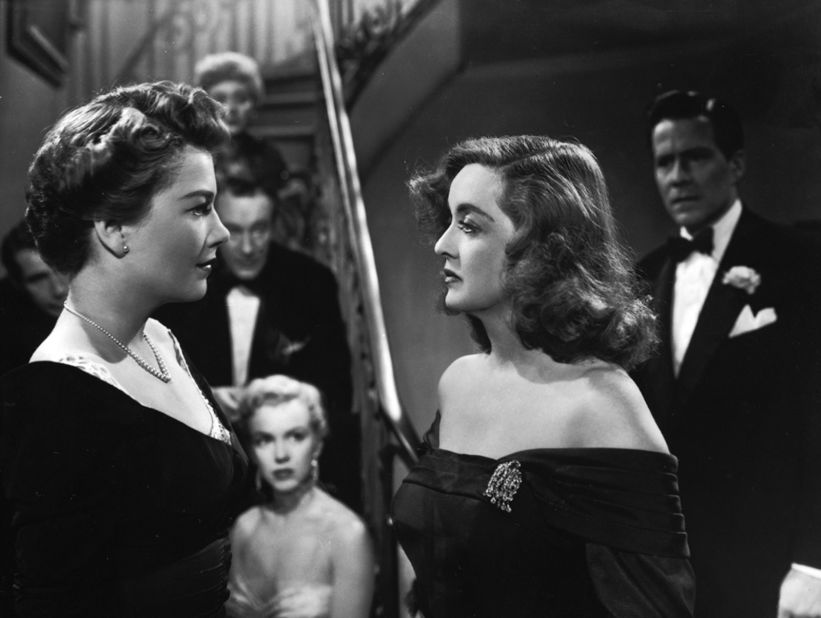 <strong>"All About Eve" (1951):</strong> Director Joseph L. Mankiewicz's screenplay about an aging actress (Bette Davis, right) battling a scheming newcomer (Anne Baxter) remains one of the most quotable movies ever almost 65 years after its release. "All About Eve" held the record for a movie with the most Oscar nominations (14) until "Titanic" tied it in 1997. A young Marilyn Monroe, center, also attracted attention in an early role. As Margo Channing (Davis' character) would say, "Fasten your seat belts, it's going to be bumpy night!" 