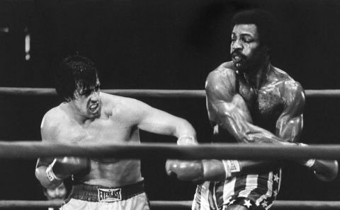 <strong>"Rocky" (1977):</strong> Sylvester Stallone, left, as struggling boxer Rocky Balboa, gets his shot at the championship against Carl Weathers as Apollo Creed in this best picture winner. Like its hero, "Rocky" was an underdog, a low-budget film written by Stallone, then an unknown actor, that became one of the decade's biggest sleeper hits. Stallone would go on to make five sequels.
