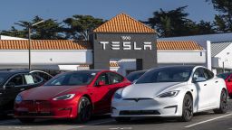 A Tesla dealership in Colma, California, U.S., on Wednesday, Jan. 26, 2022. U.S. auto sales will climb just 3.4% this year to 15.4 million cars and trucks as the semiconductor shortages continue to constrain vehicle inventory, auto dealers predict. Photographer: David Paul Morris/Bloomberg via Getty Images
