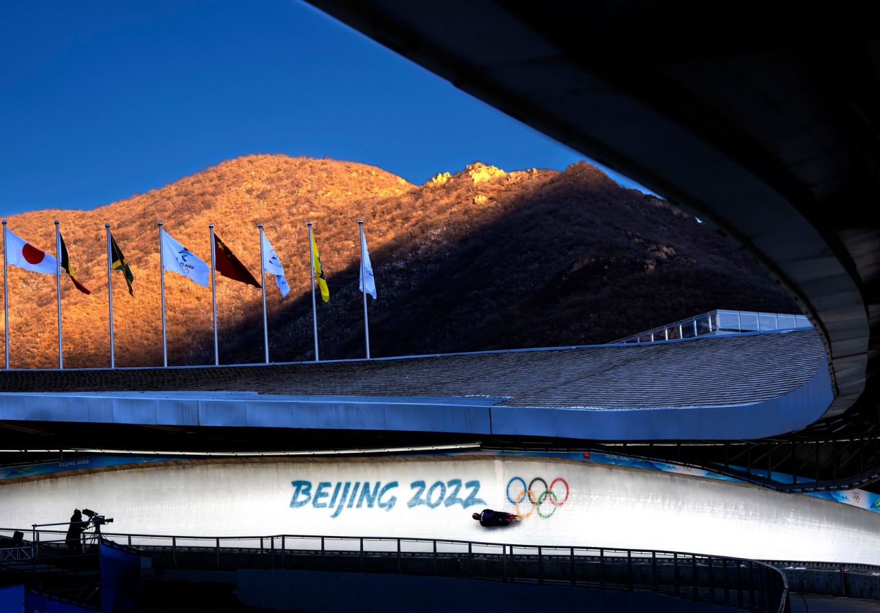 An Olympic luger trains in Beijing on Wednesday, February 2. The opening ceremony is Friday for the <a href="https://www.cnn.com/specials/sport/beijing-winter-olympics-2022" target="_blank">Beijing Winter Olympics.</a>