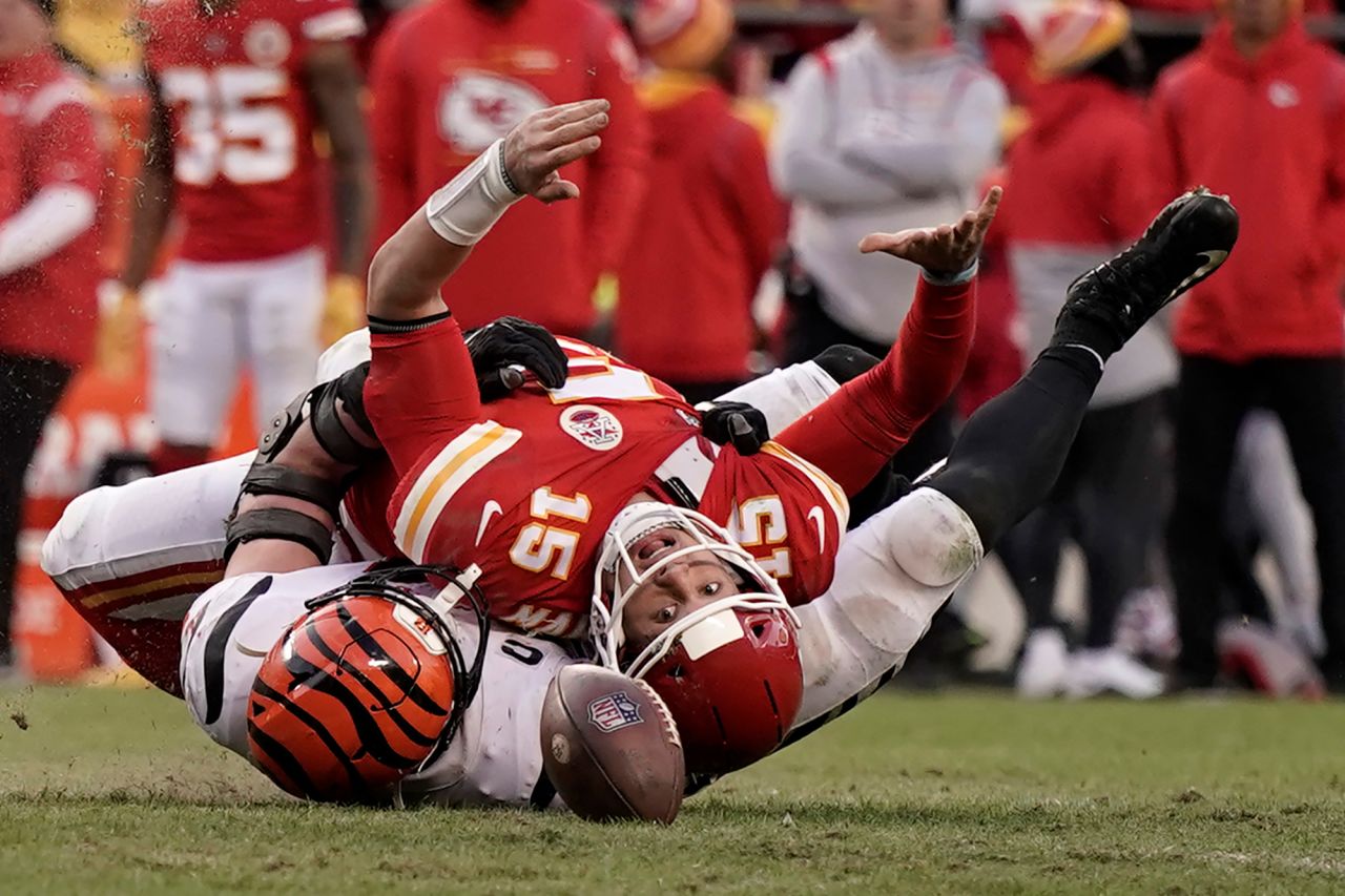 Kansas City quarterback Patrick Mahomes fumbles the ball after being sacked by Cincinnati's Sam Hubbard during the AFC Championship game on Sunday, January 30. Cincinnati defeated Kansas City 27-24 to advance to the <a href="https://www.cnn.com/2022/01/30/sport/afc-nfc-championships-super-bowl/index.html" target="_blank">Super Bowl.</a>