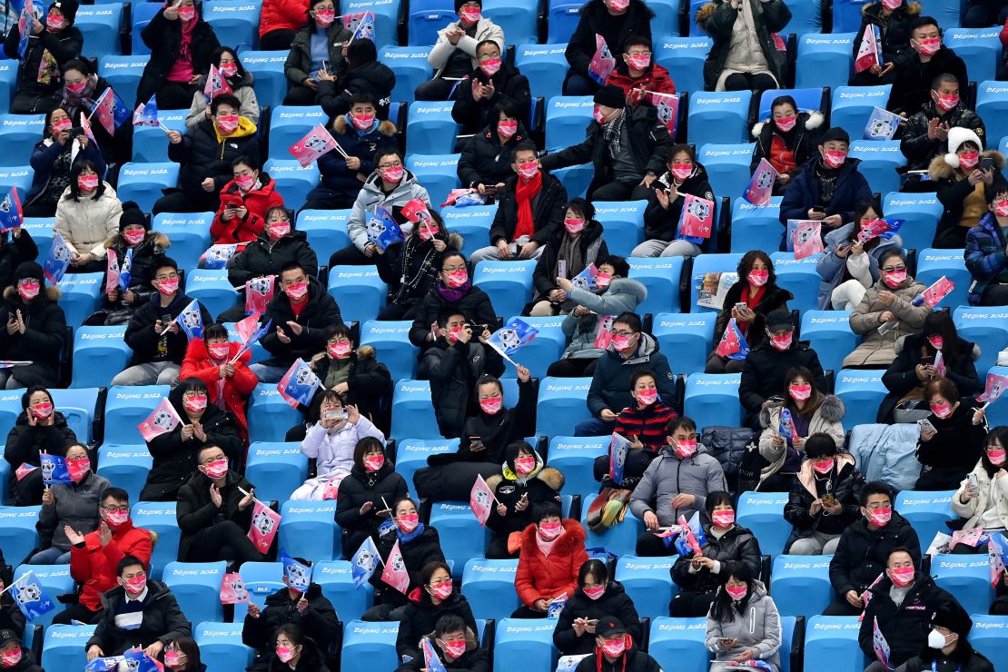 Socially distanced spectators look on prior to the Men's Single Skating Short Program Team Event on February 04.