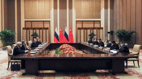 Russia's President Vladimir Putin, fourth left, and his Chinese counterpart Xi Jinping, fourth right, hold bilateral talks at the Diaoyutai State Guesthouse in Beijing on Friday.