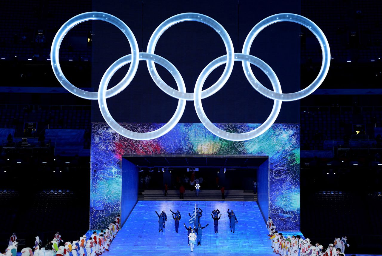Athletes Apostolos Angelis and Maria Ntanou carry the flag of Greece at the start of the parade of nations. The athletes walked into the stadium via a <a href="https://www.cnn.com/world/live-news/beijing-winter-olympics-2022-opening-ceremony-spt-intl-hnk/h_b41a124e1093c46f9deca8b7c6ad91bb" target="_blank">spectacular entrance</a> that is described as representing the "Gate of China" and "Window of China."