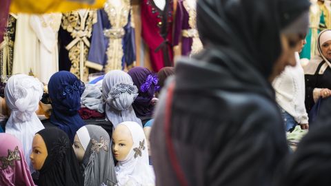 A woman visits a booth selling clothing during the 35th annual meeting of the French Muslim community on April 2, 2018 at Le Bourget, north of Paris.