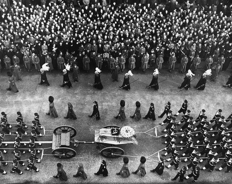 Crowds line the route of the King's funeral procession.