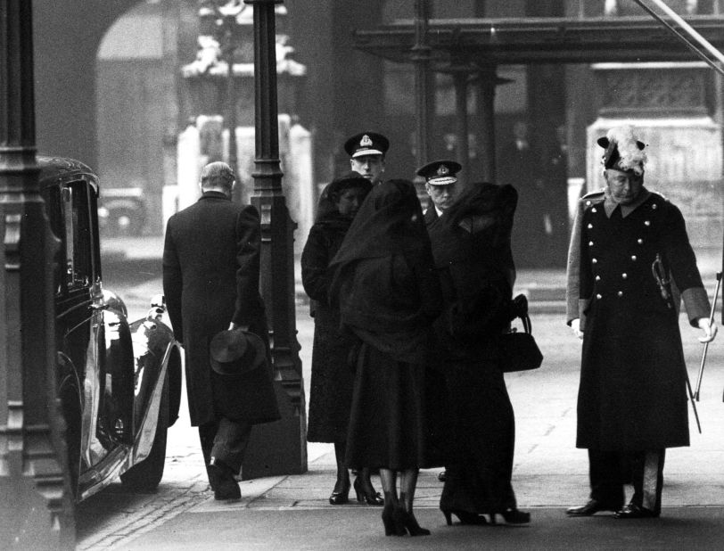 The Queen and her family arrives for her father's funeral procession on February 15, 1952.