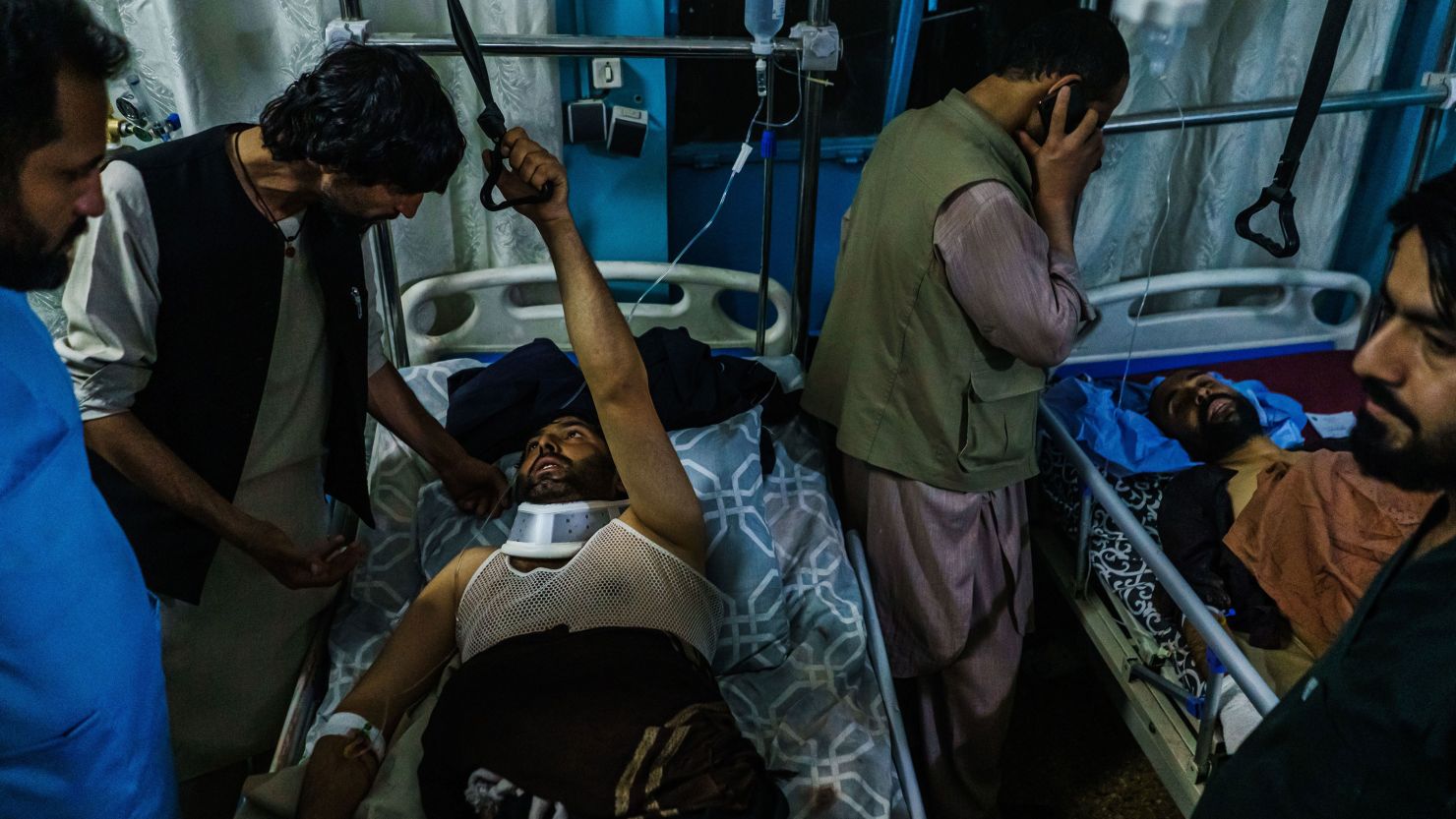 Family members visit wounded patients who had been admitted into Wazir Akbar Khan hospital. in Kabul, Afghanistan, Thursday, Aug. 26, 2021.