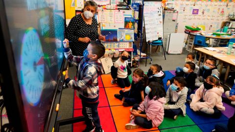 A kindergarten teacher instructs students at a Lynwood, California, elementary school on January 12, 2022.