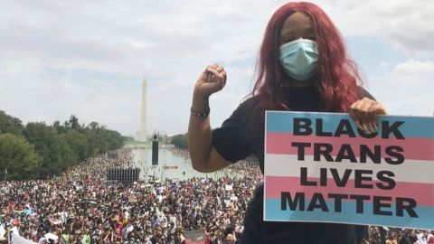 Nupol Kiazolu holds a Black Trans Lives Matter sign on August 28, 2020 at the March on Washington.