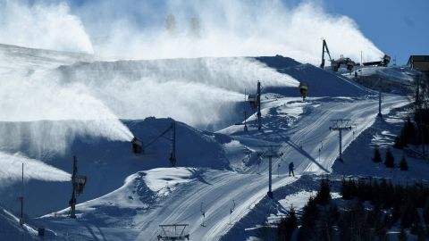Snowmaking machines during the FIS Snowboard World Cup 2022 in November, part of a 2022 Beijing Winter Olympic Games test event at the Genting Snow Park in Zhangjiakou city.