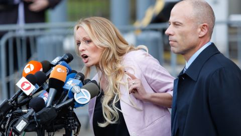 Adult-film actress Stormy Daniels speaks in New York City with her former lawyer Michael Avenatti on April 16, 2018.