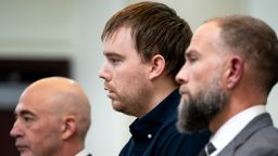 Travis Reinking, center, reacts as the verdict is read during day five of Reinking's murder trial at the Justice A.A. Birch Building in Nashville, Tenn., Friday, Feb. 4, 2022.