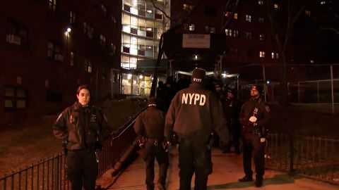 Police investigate after an off-duty NYPD officer was shot in the foot Saturday in West Harlem.