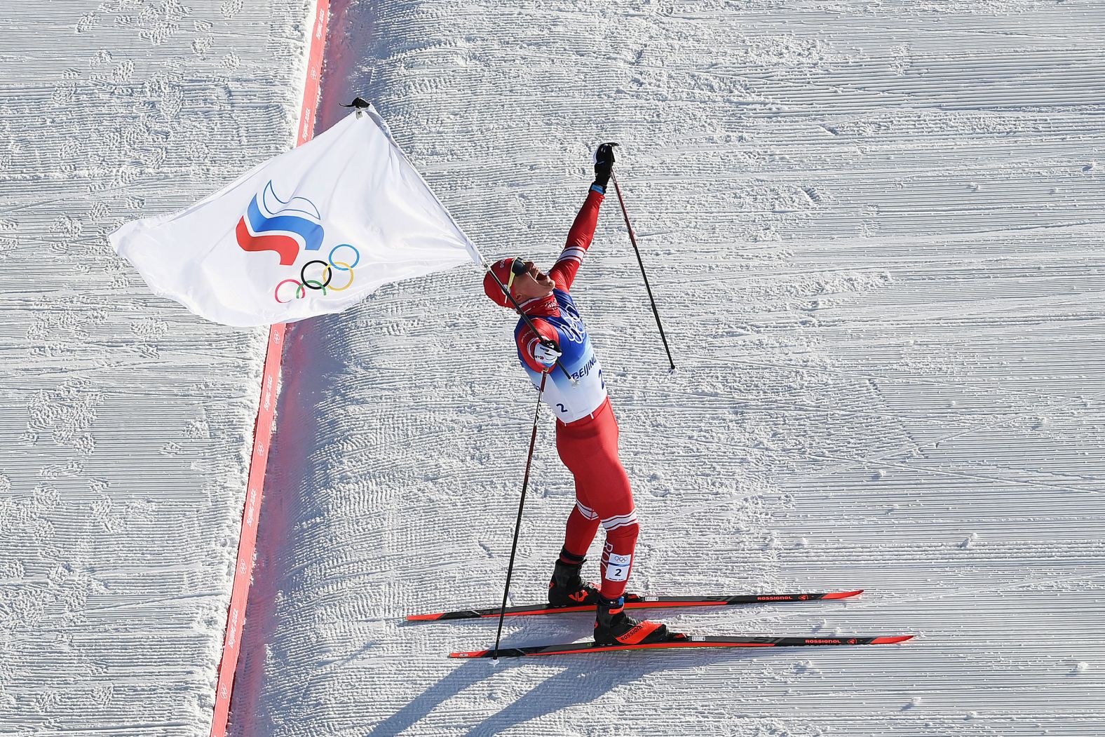 Russian Alexander Bolshunov celebrates after <a href="index.php?page=&url=https%3A%2F%2Fwww.cnn.com%2Fworld%2Flive-news%2Fbeijing-winter-olympics-02-06-22-spt%2Fh_1993a8651ad6f621e1b05e2848c9ae1e" target="_blank">winning the gold medal in the skiathlon</a> on February 6.
