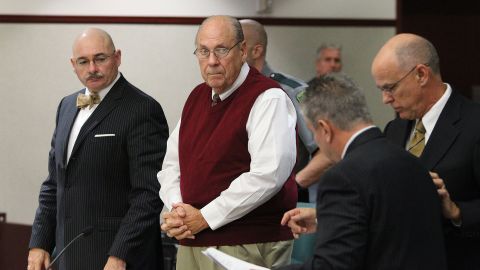 Curtis Reeves, center, stands beside his attorneys during his bond reduction hearing in Dade City, Florida, on Wednesday, Febrary 5, 2014.