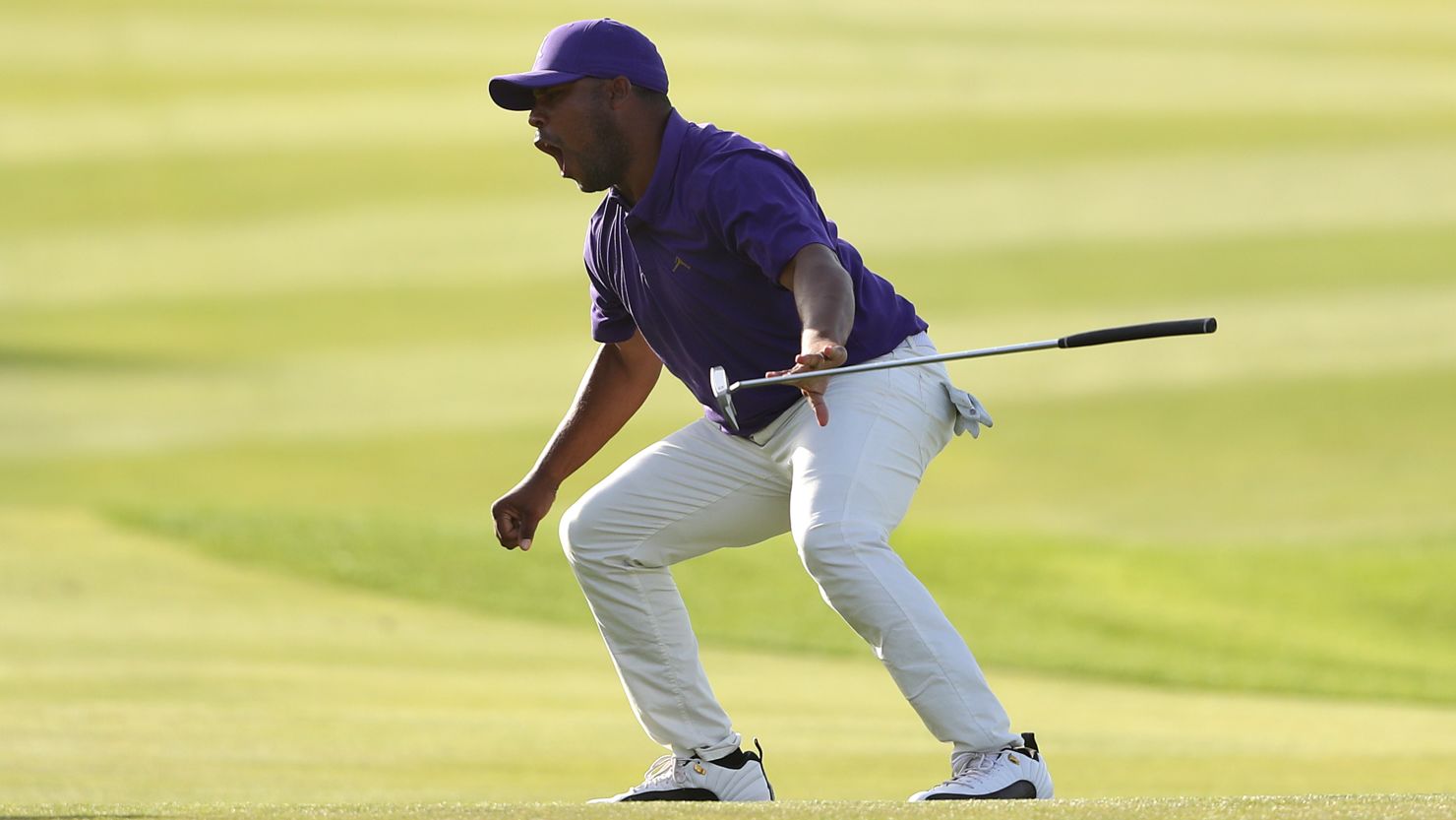 Harold Varner III celebrates after sinking an eagle putt on the 18th to win the Saudi International.