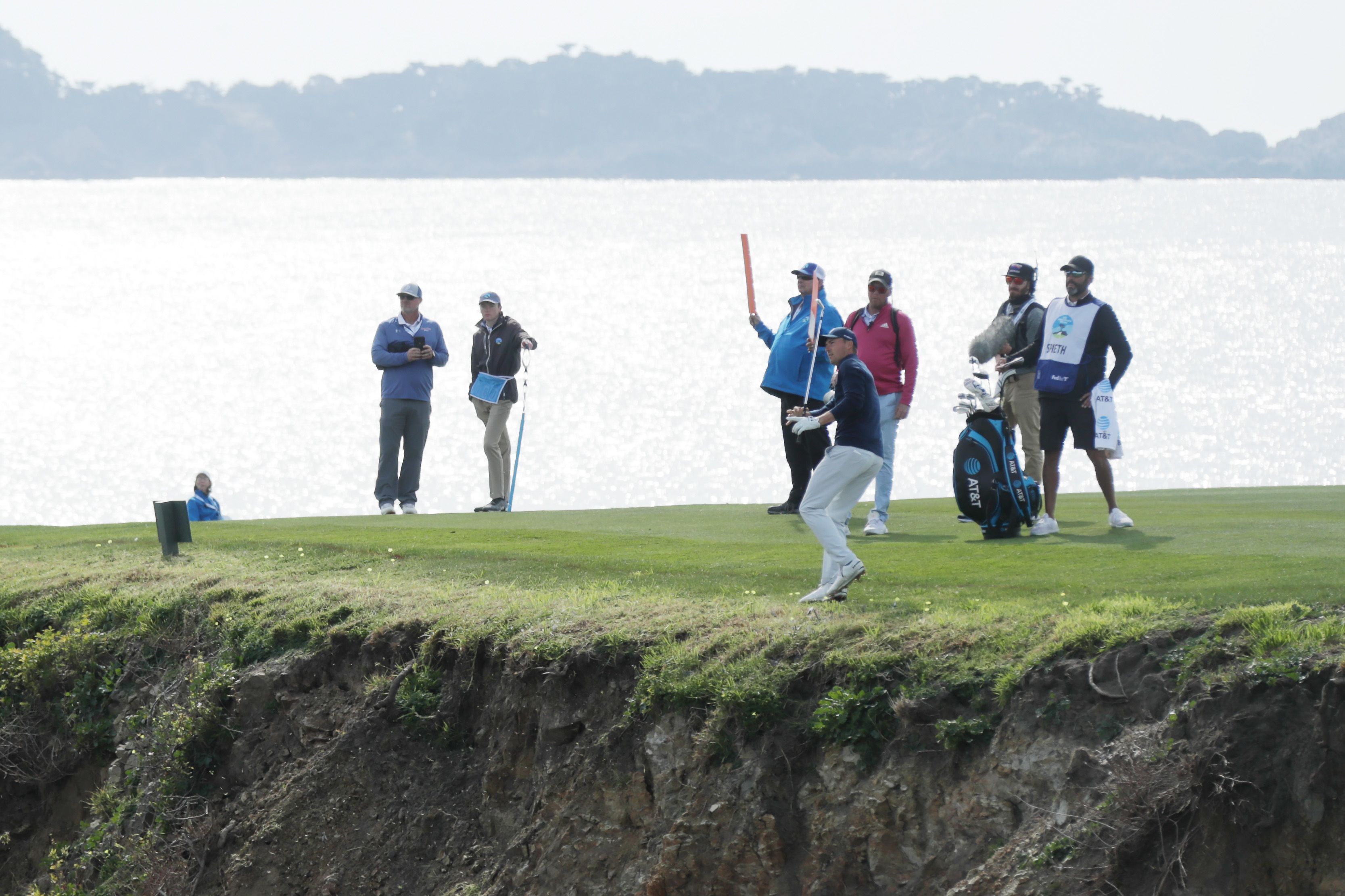 Spieth salvaged a par from the hole, with his cliff shot landing just over the green.