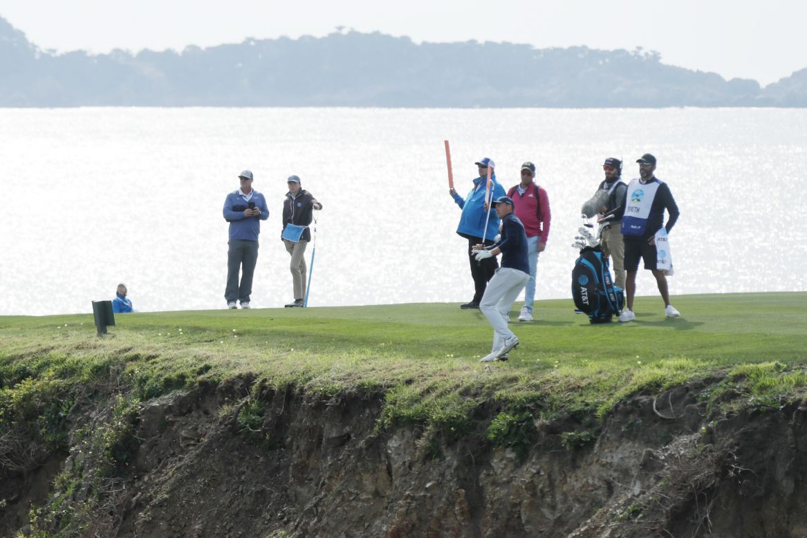 Spieth salvaged a par from the hole, with his cliff shot landing just over the green.