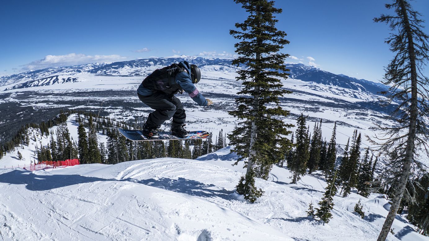 The YETI Natural Selection Tour started its second season in January at Jackson Hole, Wyoming. The series aims to bring together the best of competitive freestyle snowboarding with open mountain backcountry venues. Pictured, Austen Sweetin riding in Jackson Hole, Wyoming, January 25, 2022.