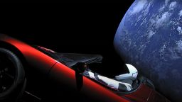 A livestream view of Elon Musk's personal Tesla roadster featuring a mannequin named "Starman" following its launch to space on February 6, 2018.