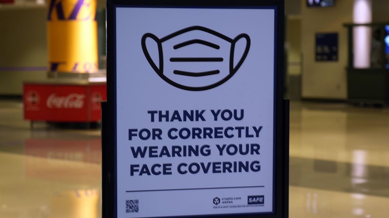 A face mask advisory sign is posted at Crypto.com Arena during an NBA game between the Los Angeles Lakers and the Sacramento Kings. 