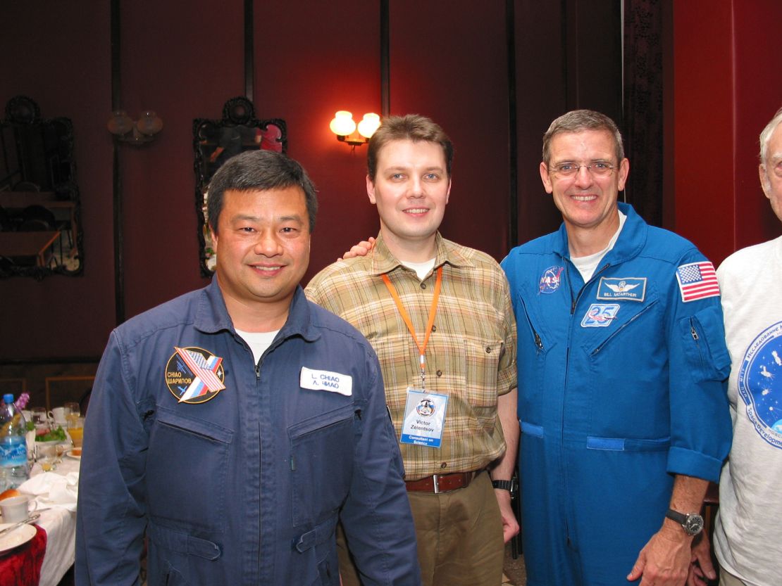 Astronaut Leroy Chiao (left) at a student event at Bauman Moscow State Technical University, with Victor Zelentsov and Bill McArthur, in July 2004.