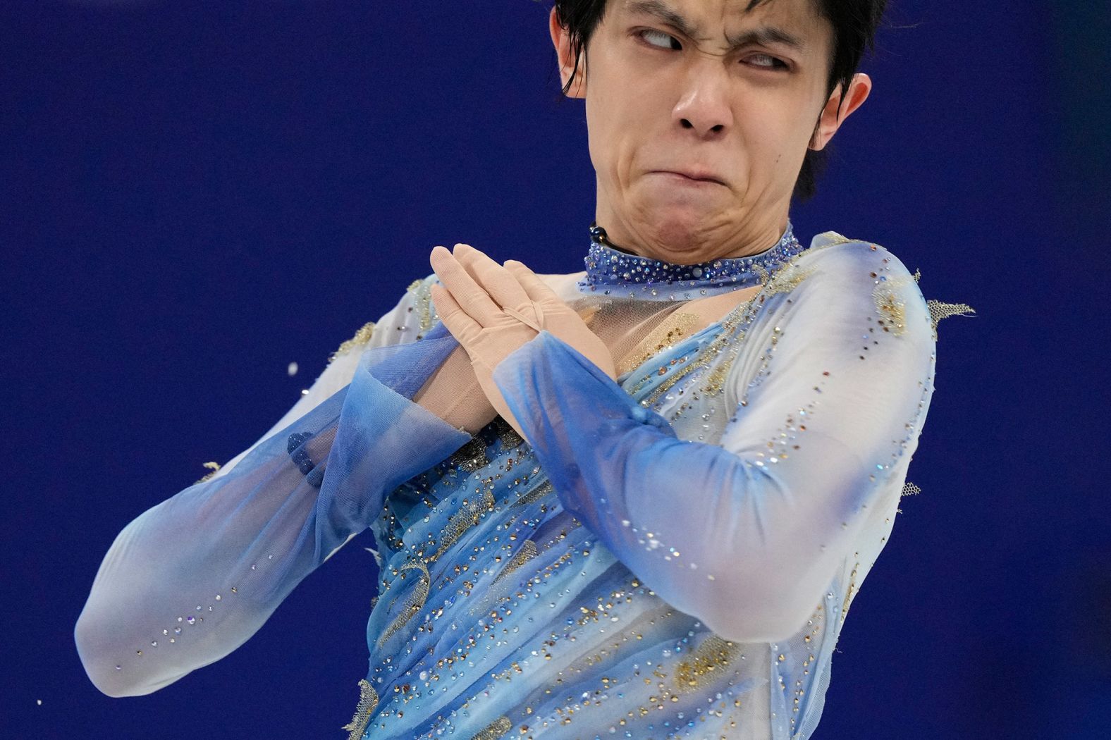 Japanese figure skater Yuzuru Hanyu skates on February 8. Hanyu, the defending Olympic champion who also won gold in 2014, was in eighth place after a disappointing short program.