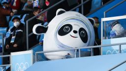 BEIJING, CHINA - FEBRUARY 05: A worker dressed as Bing Dwen Dwen, the mascot of the 2022 Winter Olympics, performs in the stands during the Mixed Team Relay Final A on day one of the Beijing 2022 Winter Olympic Games at Capital Indoor Stadium on February 5, 2022 in Beijing, China. (Photo by Liu Lu/VCG via Getty Images)