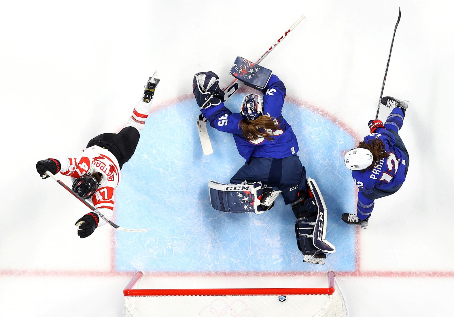 Canada's Jamie Lee Rattray, left, reacts after scoring a goal against the United States during a women's hockey game on February 8. <a href="index.php?page=&url=https%3A%2F%2Fwww.cnn.com%2Fworld%2Flive-news%2Fbeijing-winter-olympics-02-08-22-spt%2Fh_8b437024e1f1fc74713710821cb3d75b" target="_blank">Canada won 4-2.</a>