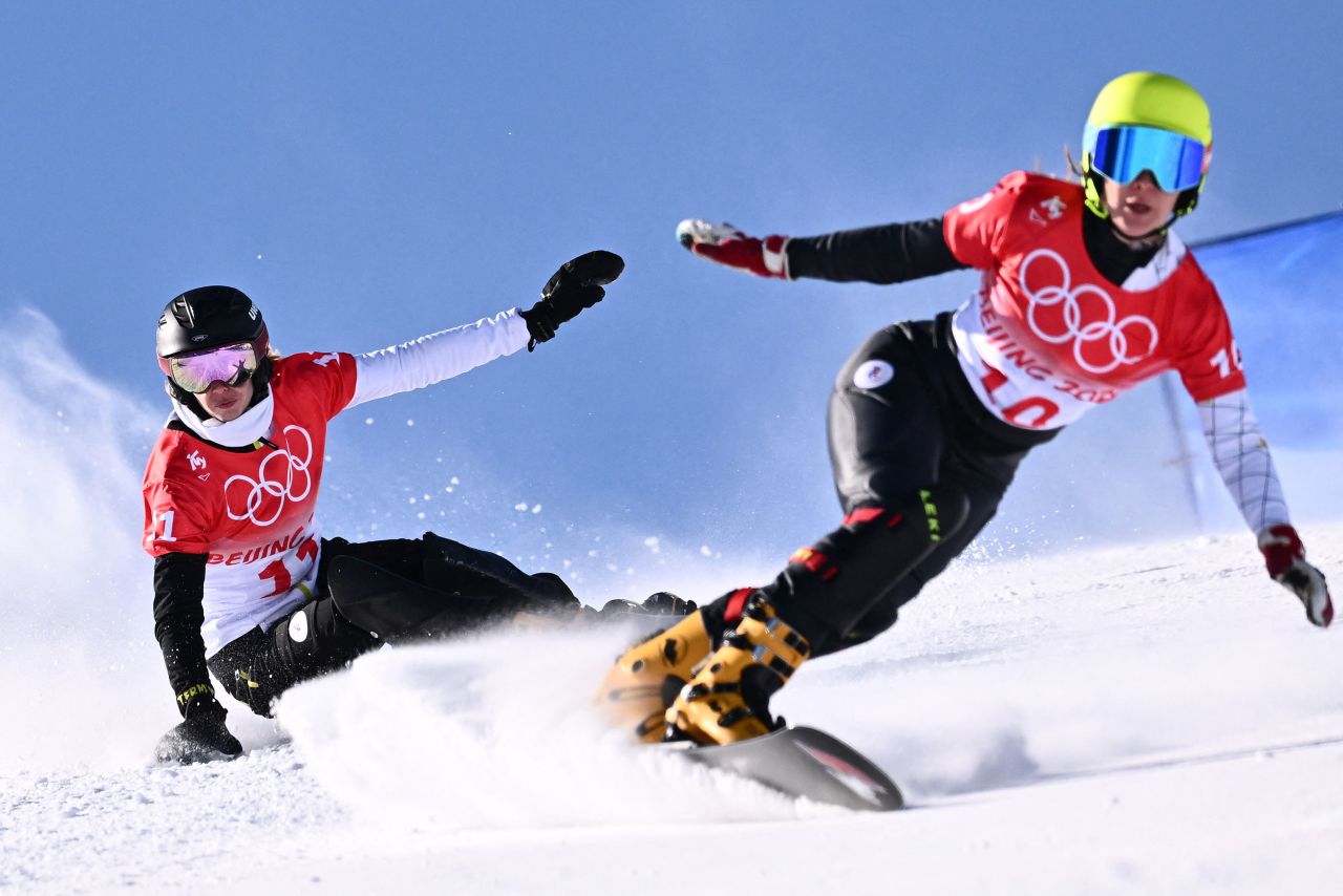 From left, Russian snowboarders Natalia Soboleva and Polina Smolentsova race each other in the parallel giant slalom on February 8.