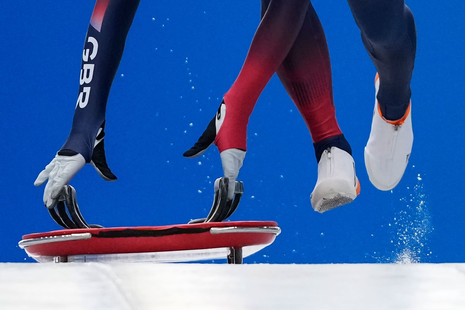 Great Britain's Laura Deas runs down the track at the start of a skeleton training run on February 8.