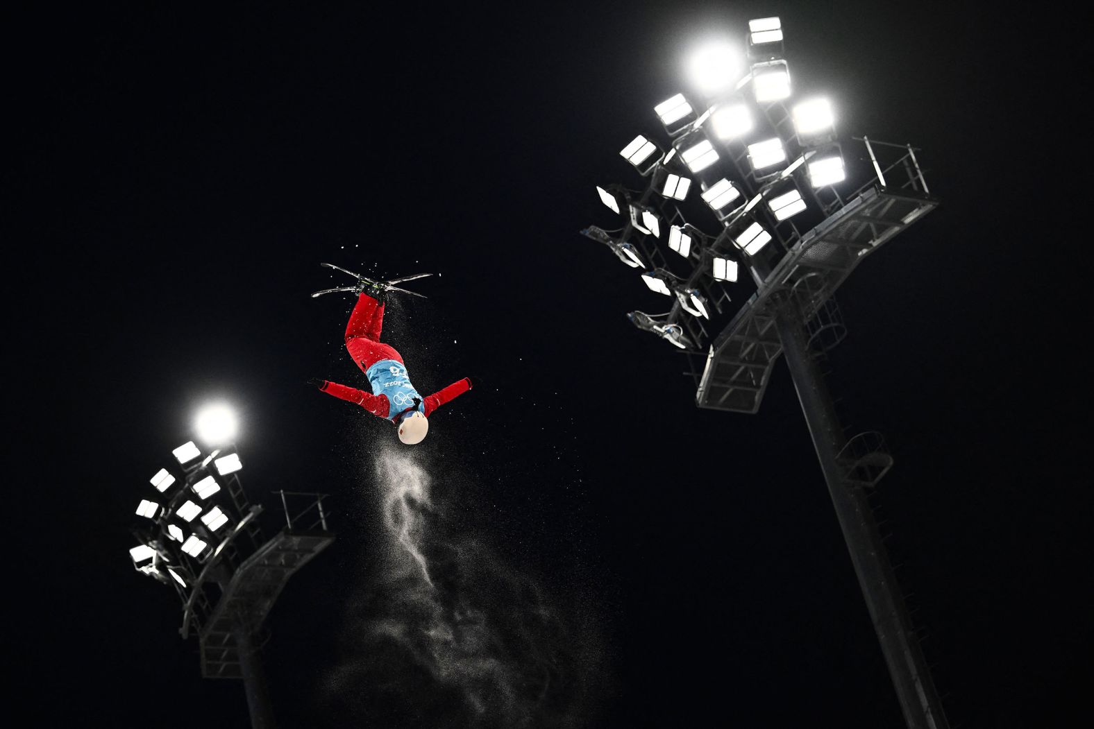 A forerunner jumps during an aerials training session on February 8.