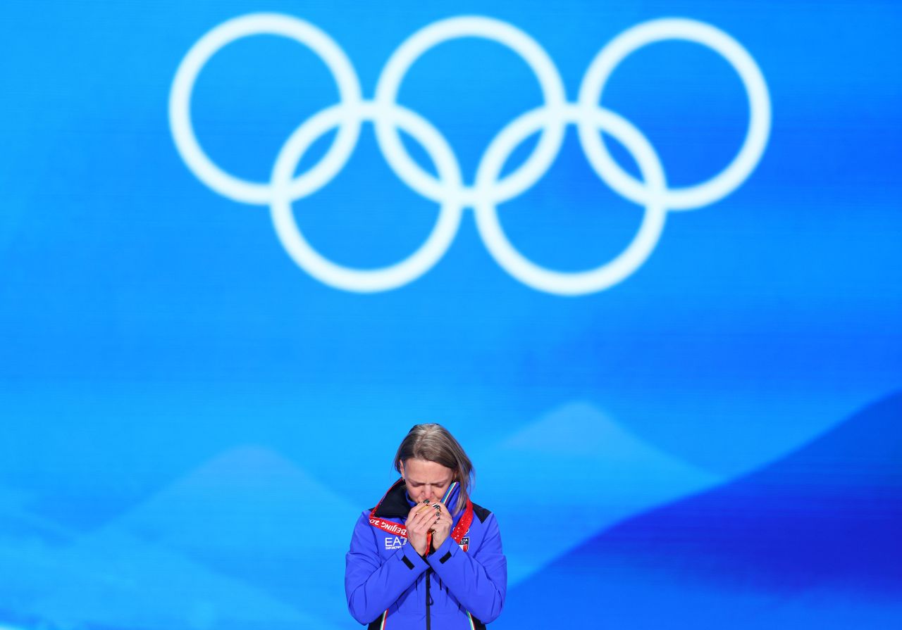 Italy's Arianna Fontana kisses her gold medal after winning the 500-meter short track race on February 8. She has won more Olympic medals than any short track skater in history.