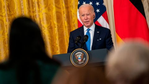 Chancellor Olaf Scholz and President Joe Biden participate in a joint press conference in the East Room of The White House on Monday.